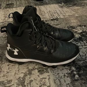 Under Armour football cleats.